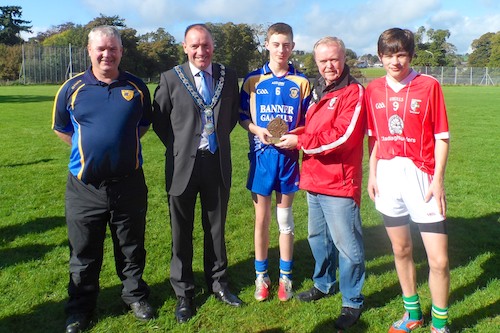 Newry & Mourne Mayor Michael Ruane pictured with members of Craobh Rua Camlocha and the Banner Hurling Club  Ennis